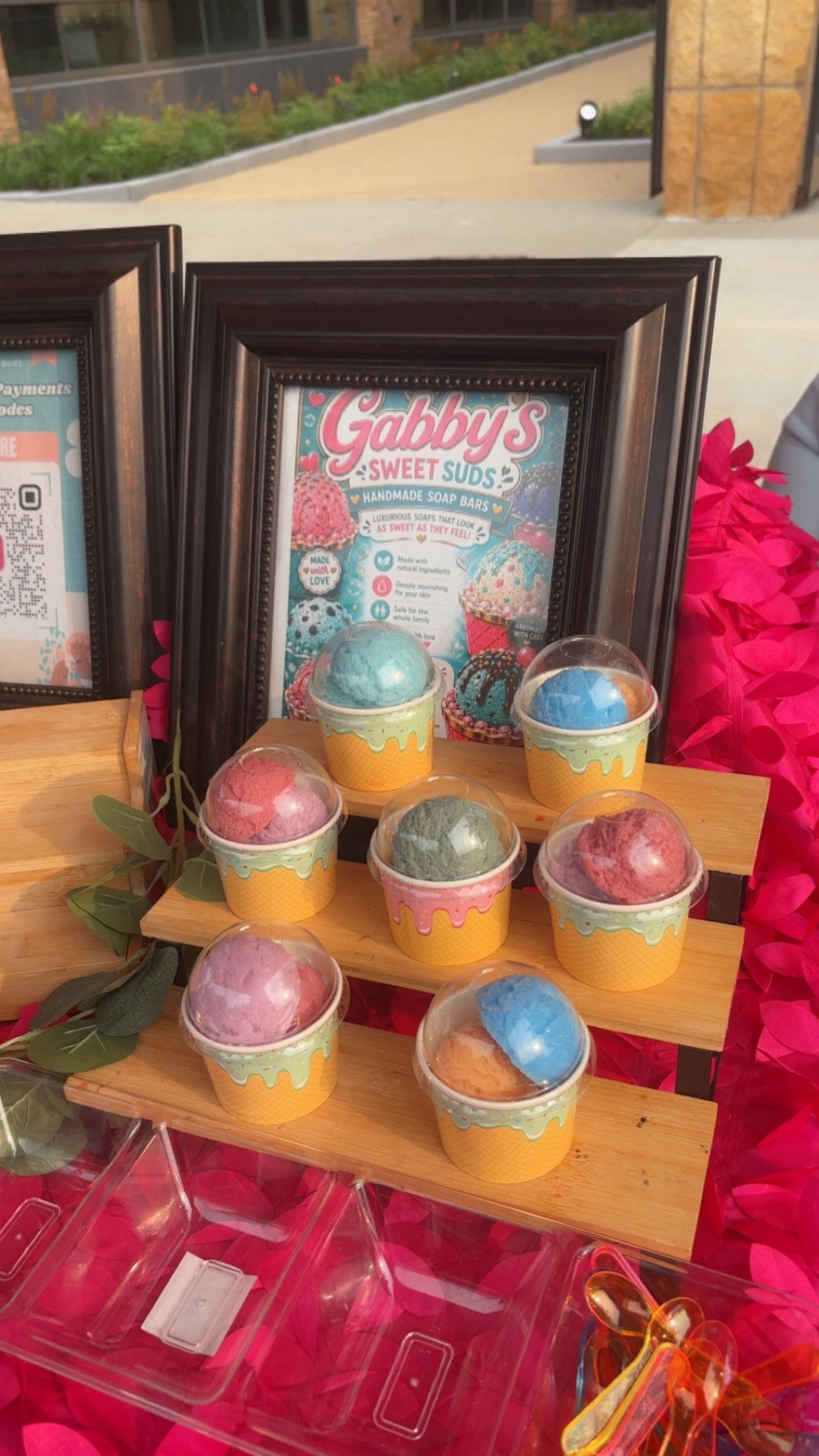 Gabby's Sweet Suds handmade soap bars displayed at a festival vendor booth