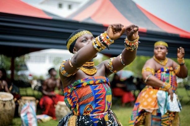 Child performing traditional African dance