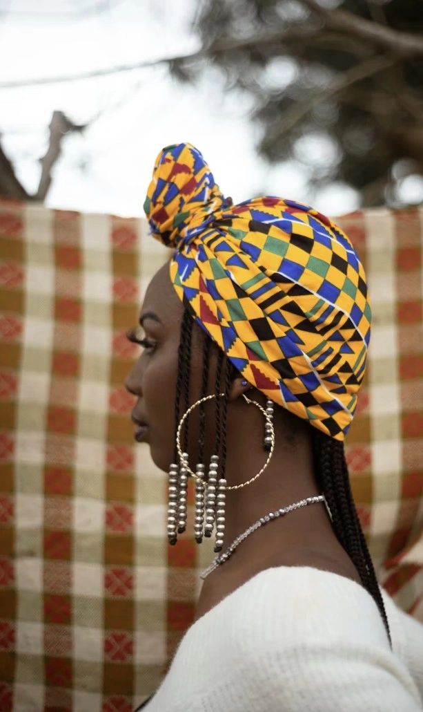 Woman wearing geometric patterned head wrap